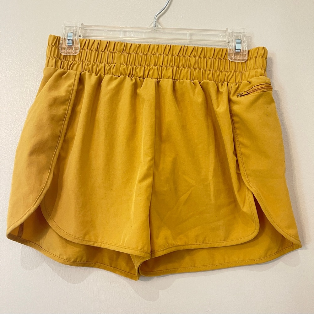 Lalala Running  Shorts with Elastic Waistband and Dolphin Hem